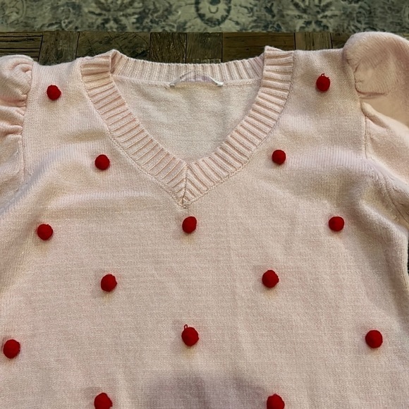Pink V Neck Sweater With Puff Sleeves and Red Pom Poms - Picture 4 of 11